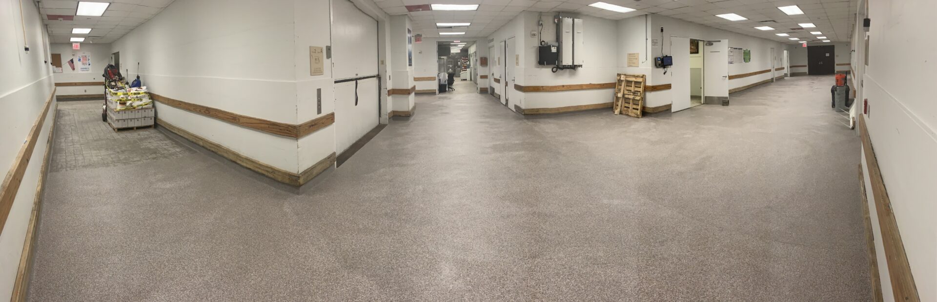 Empty hospital corridor with supply carts